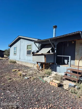 a front view of a house with yard