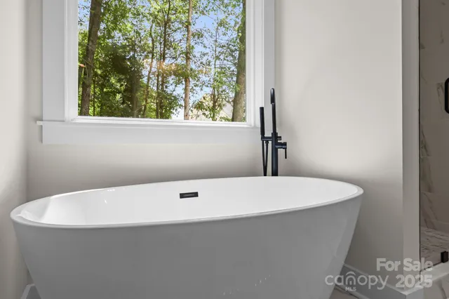 a bathroom with a bathtub