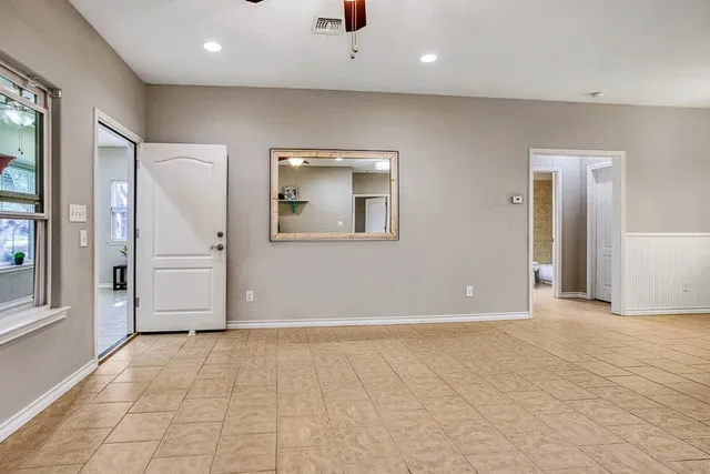 a view of a electric appliances in kitchen and a window