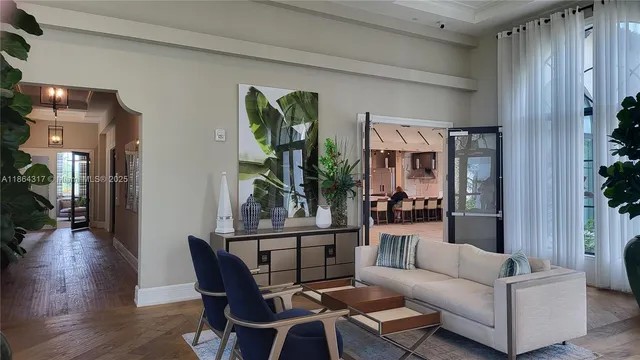 a living room with furniture and a window