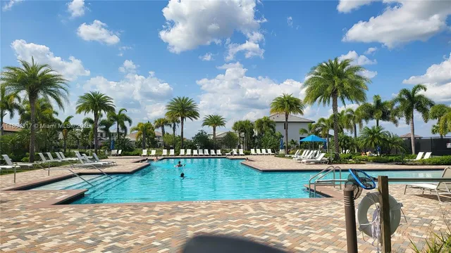 a view of a swimming pool and chair