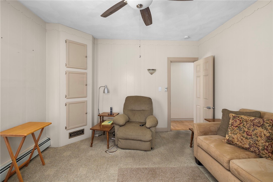 20 Gridley Street Providence, RI 02904 - Photo 12 of 50 Unit 1 - Being used as a den. Carpet, high ceilings, cupboard space