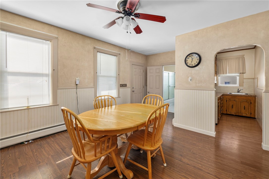 20 Gridley Street Providence, RI 02904 - Photo 20 of 50 Unit 2- Kitchen/Dining area with high ceilings, laminate flooring, baseboards- serviced by gas heating system