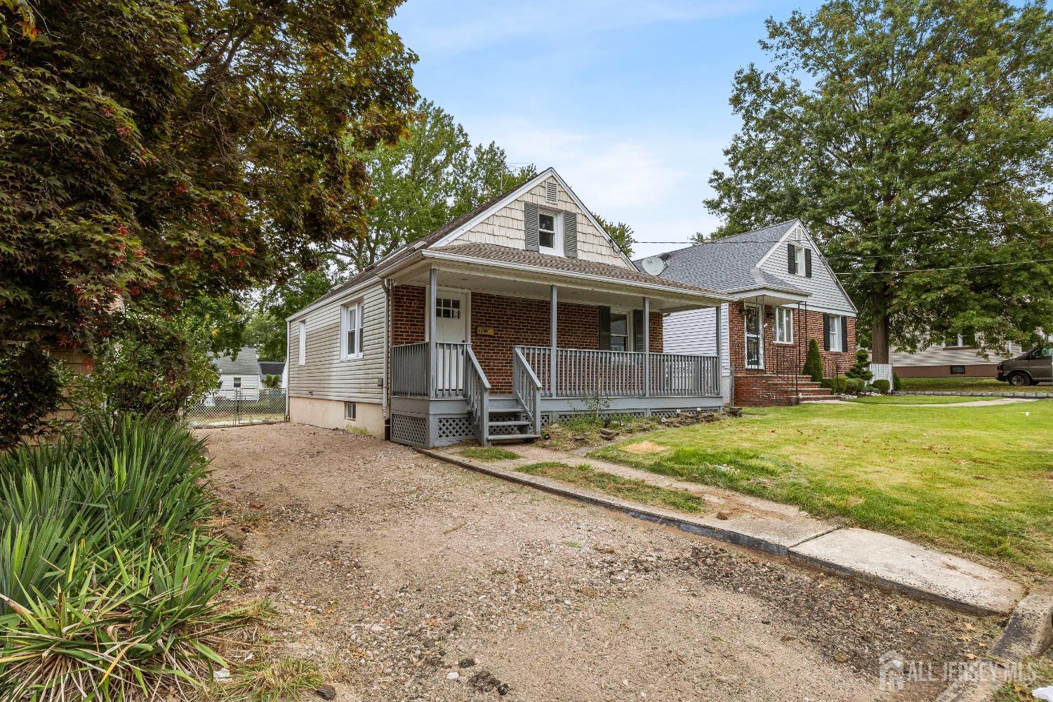 92 Highfield Road Colonia, NJ 07067 - Photo 1 of 25 a front view of a house with garden
