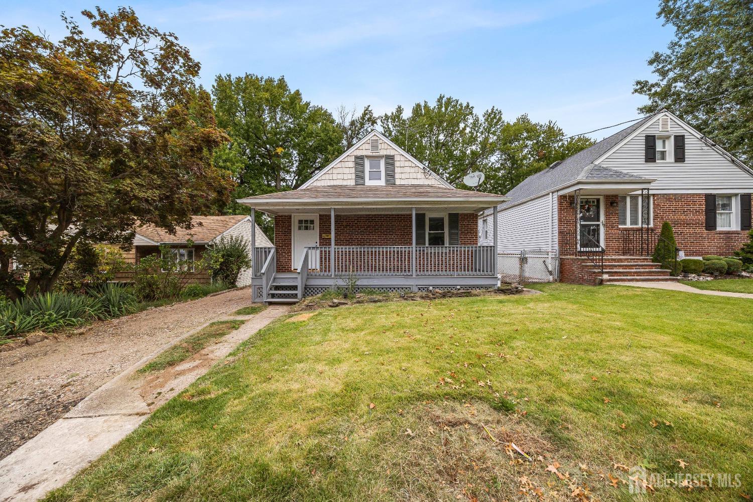 92 Highfield Road Colonia, NJ 07067 - Photo 25 of 25 a front view of a house with a garden