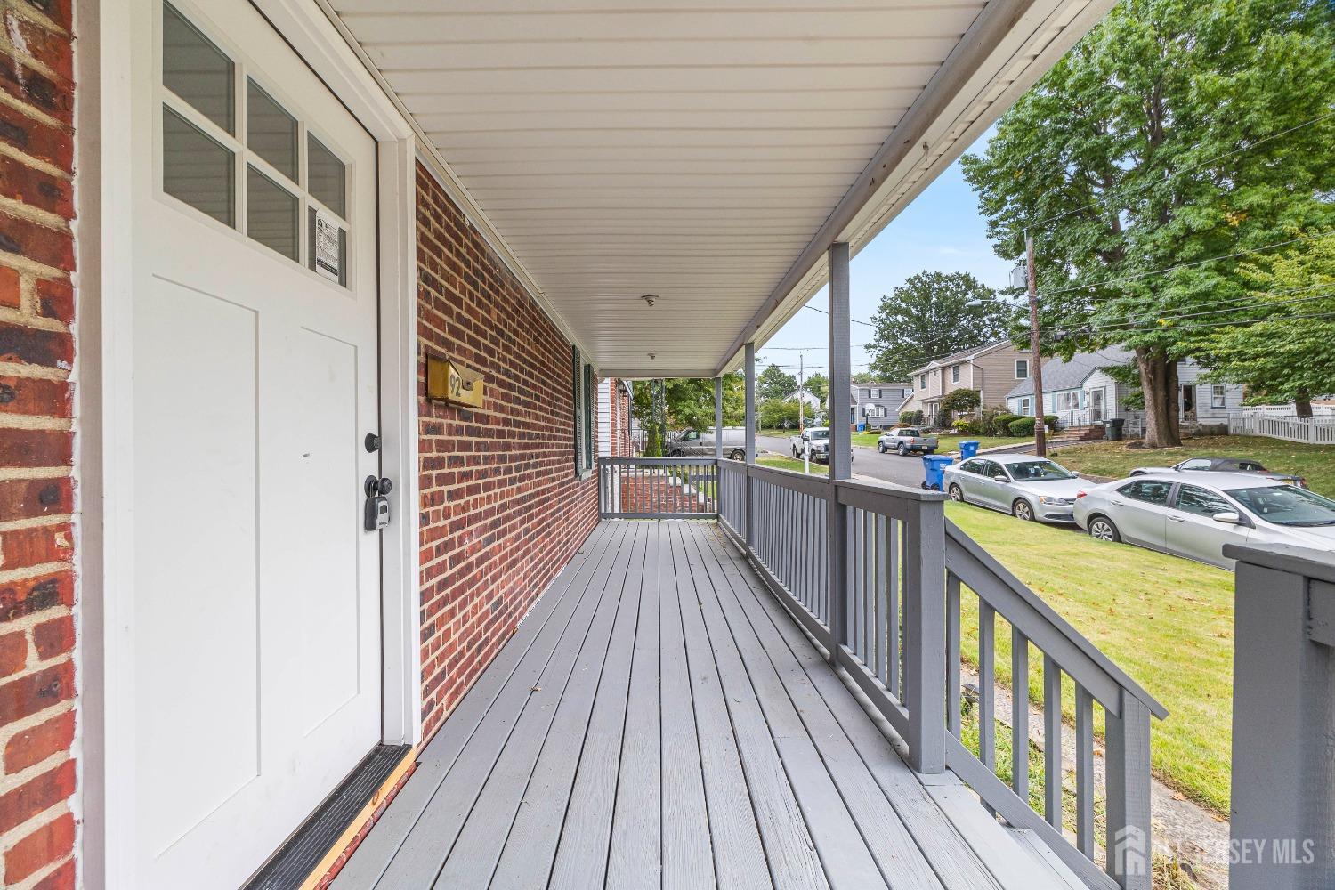 92 Highfield Road Colonia, NJ 07067 - Photo 3 of 25 a view of a house with wooden deck