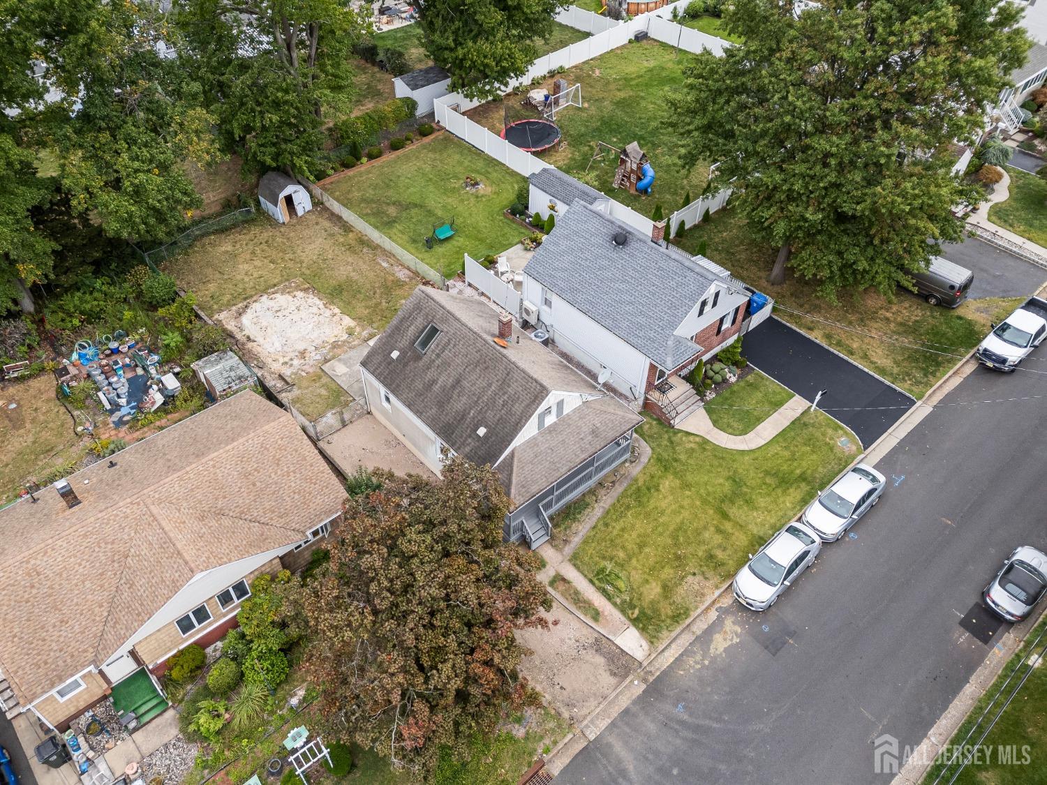 92 Highfield Road Colonia, NJ 07067 - Photo 4 of 25 an aerial view of a house