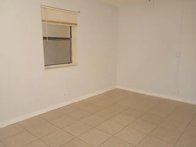 an empty room and a window