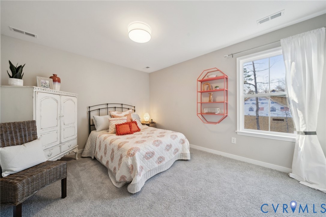 Lot 3 Kennington Aylett, VA 23009 - Photo 23 of 41 a bedroom with a bed and a window
