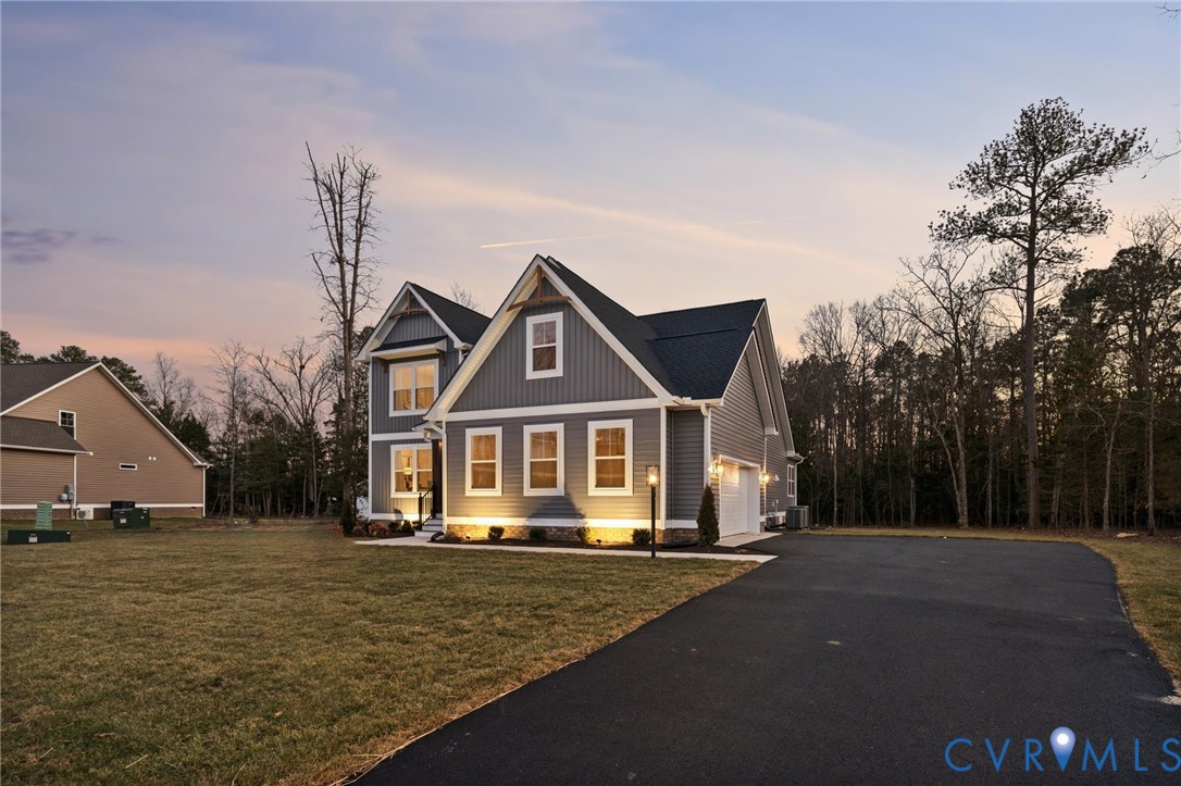 Lot 3 Kennington Aylett, VA 23009 - Photo 38 of 41 a front view of a house with a yard