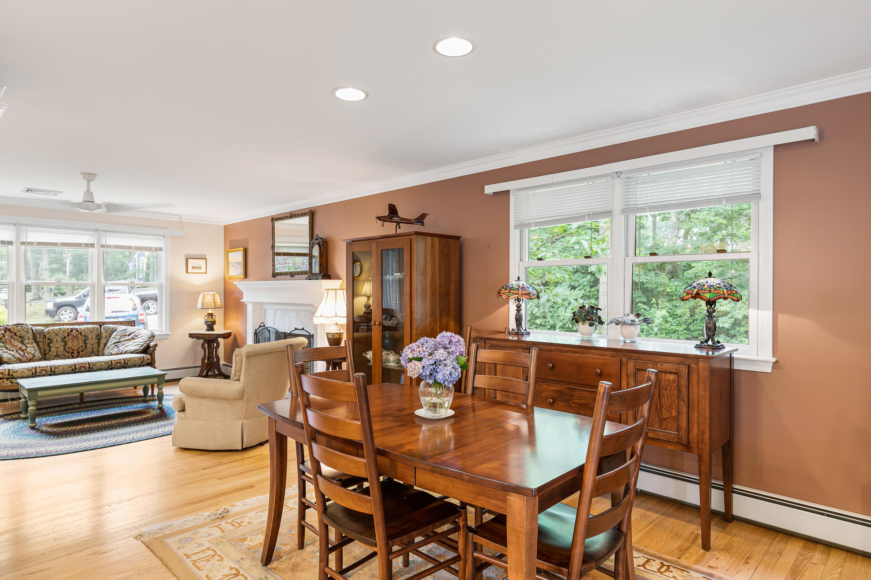 64 Hilltop Road Mashpee, MA 02649 - Photo 11 of 36 a view of a dining room with furniture window and outside view