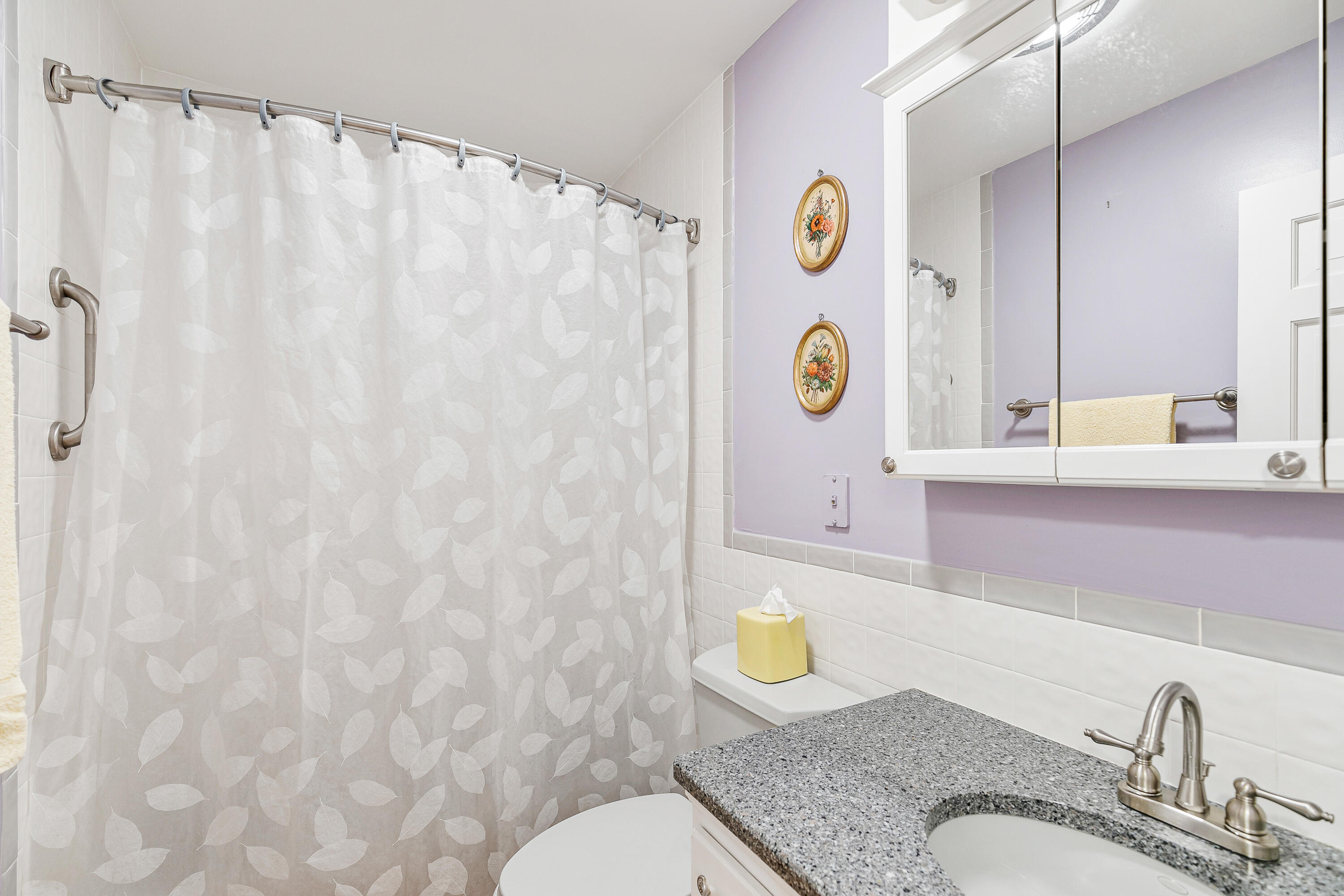 64 Hilltop Road Mashpee, MA 02649 - Photo 22 of 36 a bathroom with a granite countertop sink and a mirror