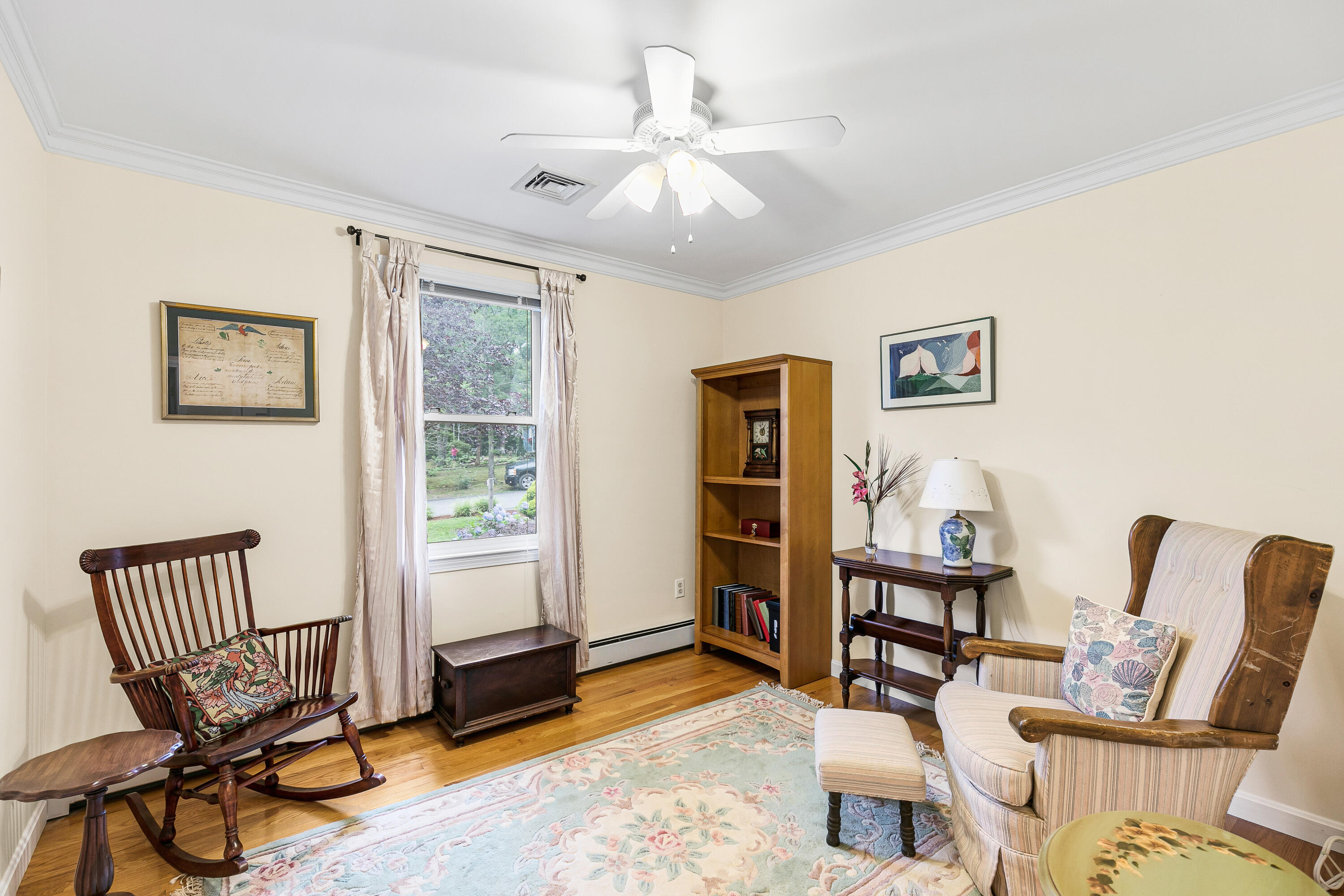 64 Hilltop Road Mashpee, MA 02649 - Photo 23 of 36 a living room with furniture and a window