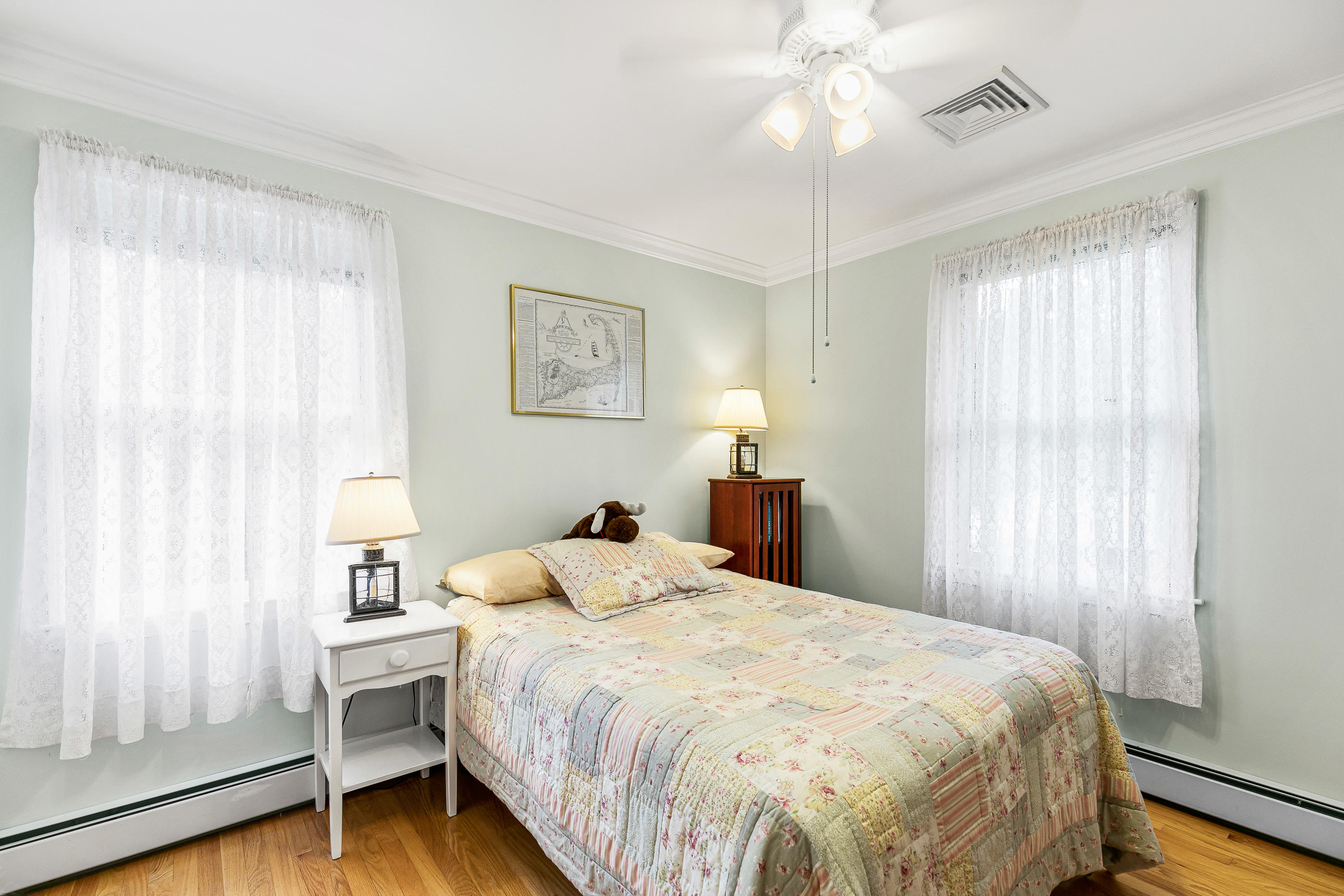 64 Hilltop Road Mashpee, MA 02649 - Photo 24 of 36 a bedroom with a bed and a window