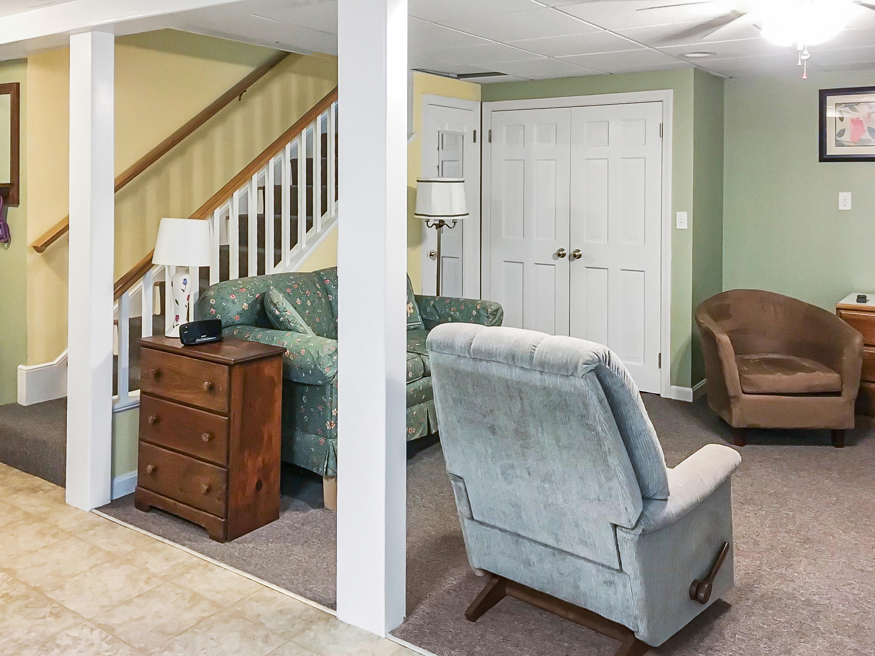 64 Hilltop Road Mashpee, MA 02649 - Photo 31 of 36 a living room with furniture and a walk in closet