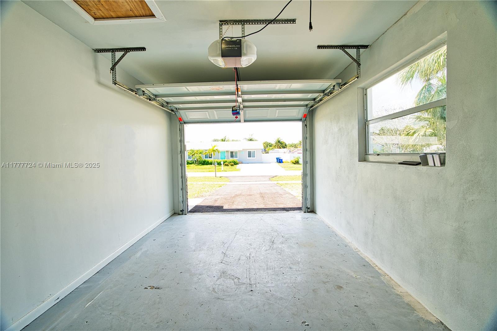 697 Pawnee Street Jupiter, FL 33458 - Photo 44 of 46 a view of a room with window