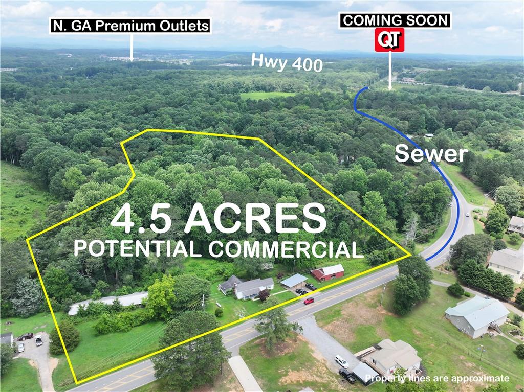 4065 Jot Em Down Road Cumming, GA 30028 - Photo 1 of 19 a view of a sign board with street view