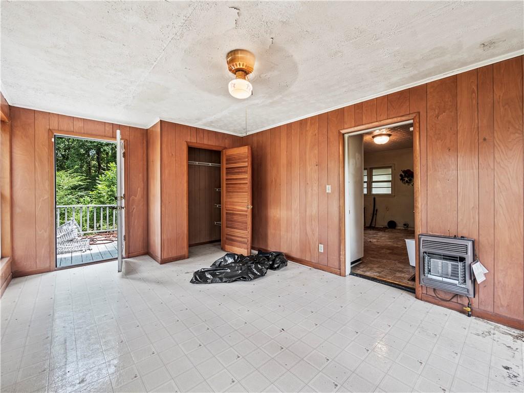 4065 Jot Em Down Road Cumming, GA 30028 - Photo 16 of 19 a view of a livingroom with a staircase
