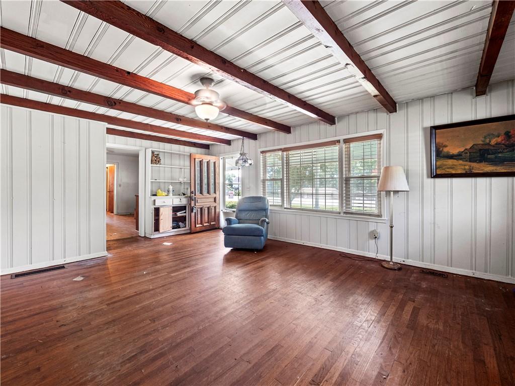 4065 Jot Em Down Road Cumming, GA 30028 - Photo 8 of 19 a view of a livingroom with wooden floor and furniture