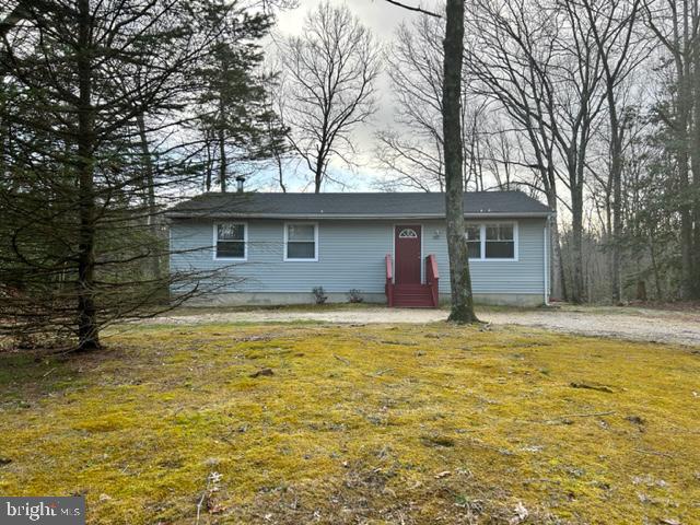 303 Three Bridge Road Monroeville, NJ 08343 - Photo 1 of 13 a view of a house with a swimming pool
