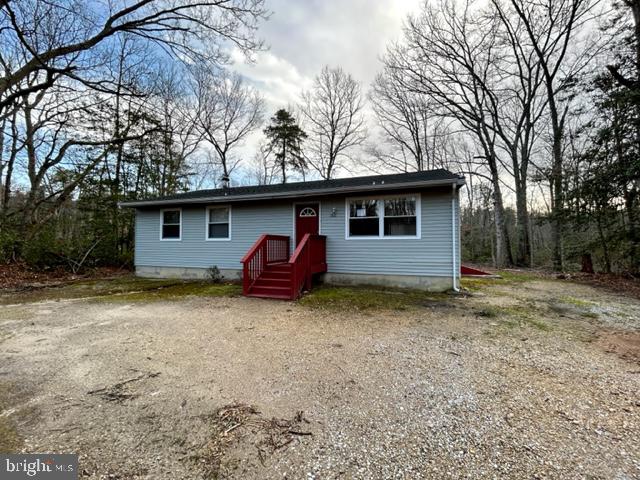303 Three Bridge Road Monroeville, NJ 08343 - Photo 2 of 13 a house view with a backyard space