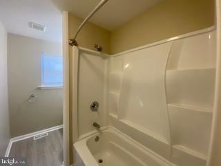 303 Three Bridge Road Monroeville, NJ 08343 - Photo 7 of 13 a bathroom with a bathtub and a shower