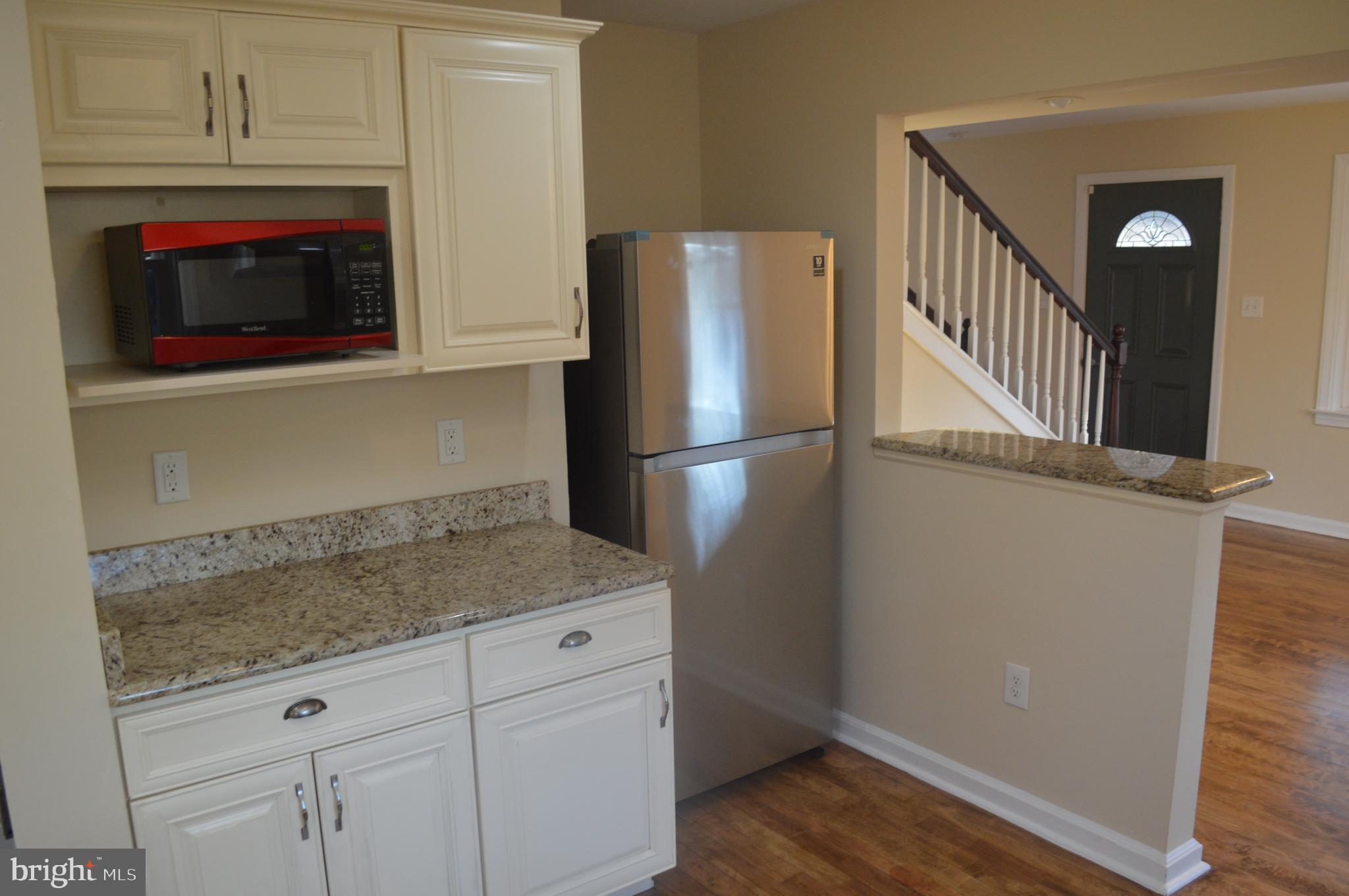 2 Kirk Lane Brookhaven, PA 19015 - Photo 8 of 43 Kitchen with breakfast bar