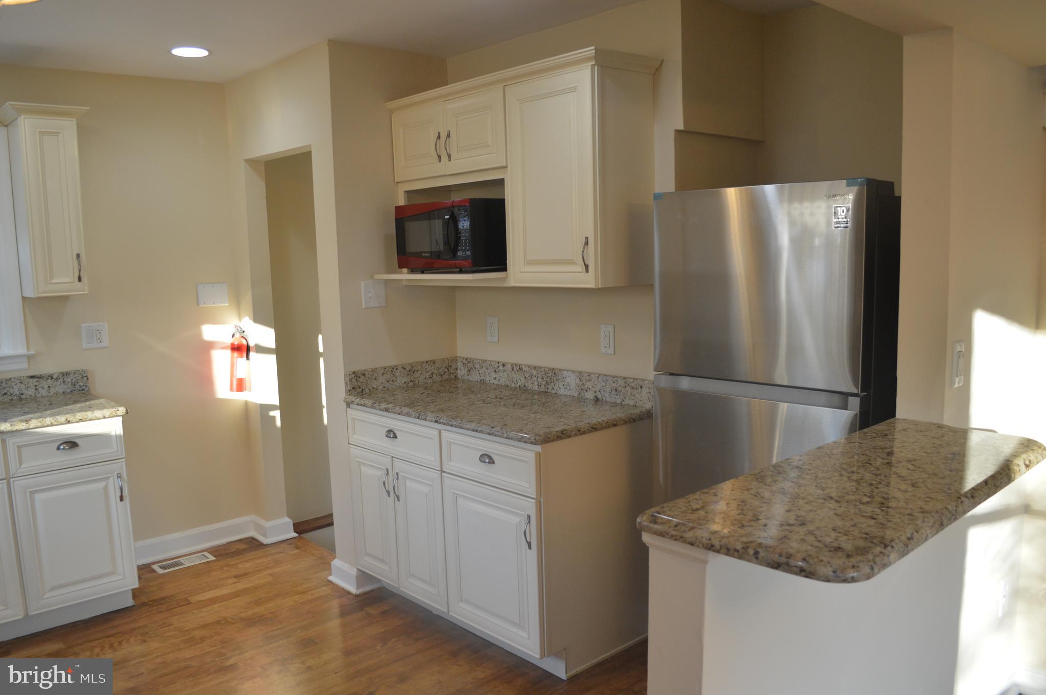 2 Kirk Lane Brookhaven, PA 19015 - Photo 10 of 43 Kitchen view with vreakfast bar