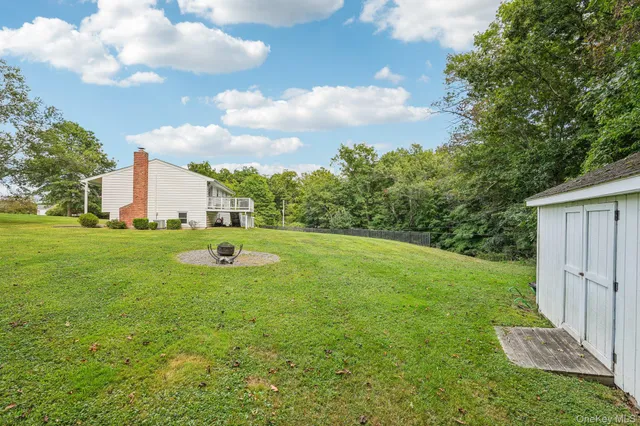 a view of a house with a big yard