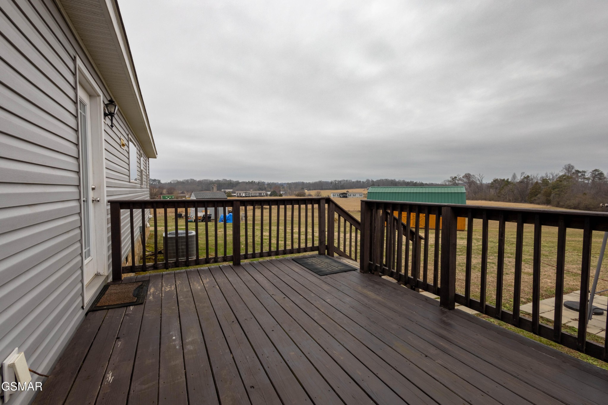1165 Ballplay Road Madisonville, TN 37354 - Photo 22 of 34 a view of wooden balcony with wooden floor