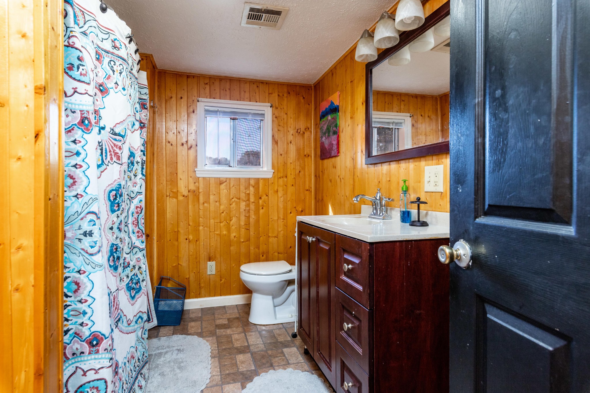 232 Pattie Gap Road Philadelphia, TN 37846 - Photo 18 of 31 a bathroom with a sink toilet and shower