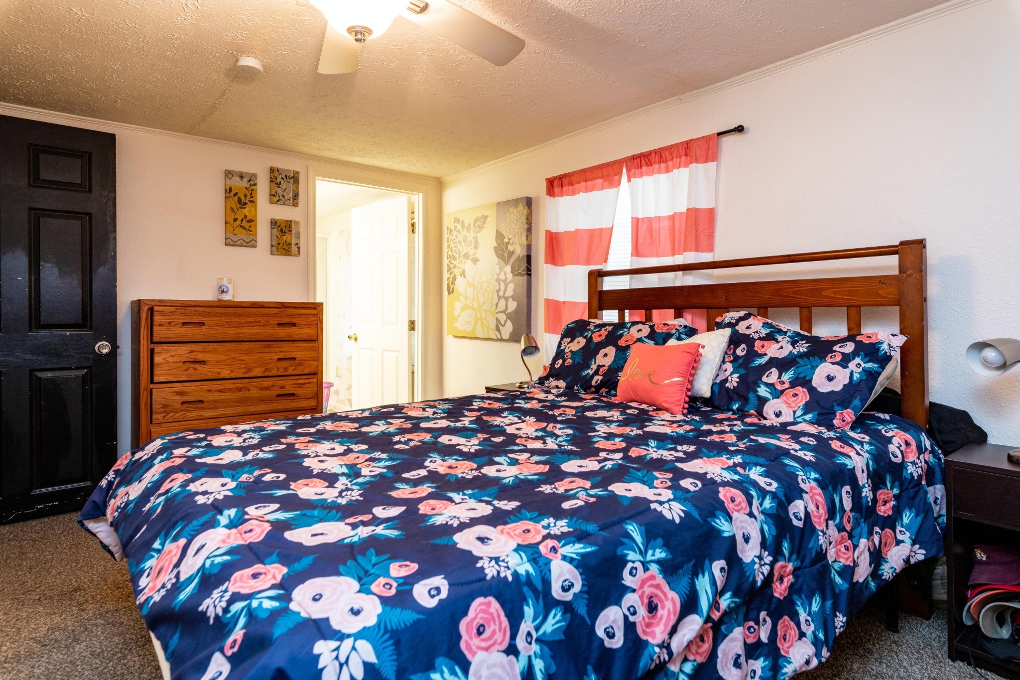 232 Pattie Gap Road Philadelphia, TN 37846 - Photo 22 of 31 a bed sitting in a bedroom next to a window