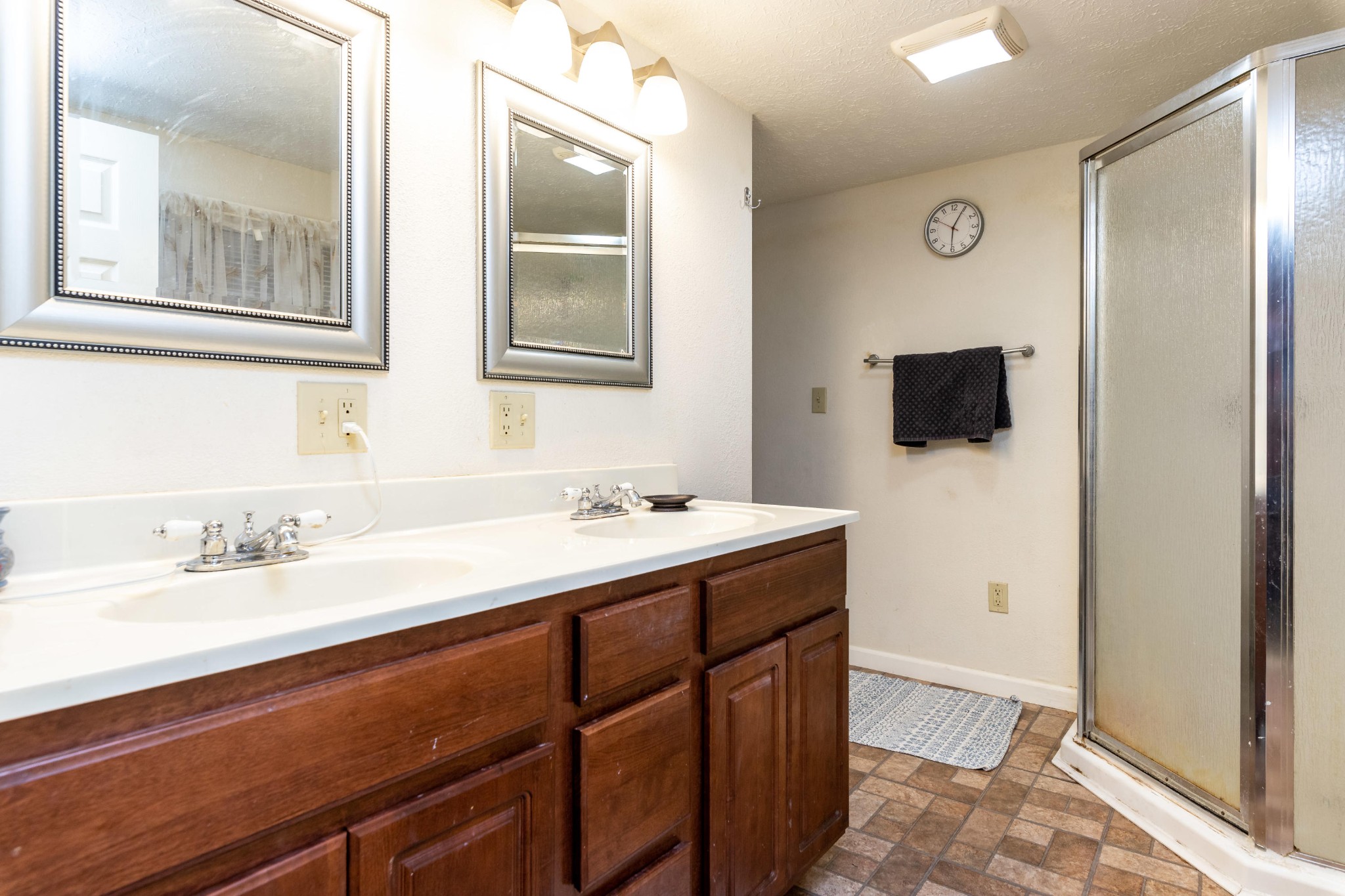 232 Pattie Gap Road Philadelphia, TN 37846 - Photo 23 of 31 a bathroom with a sink double vanity and a mirror