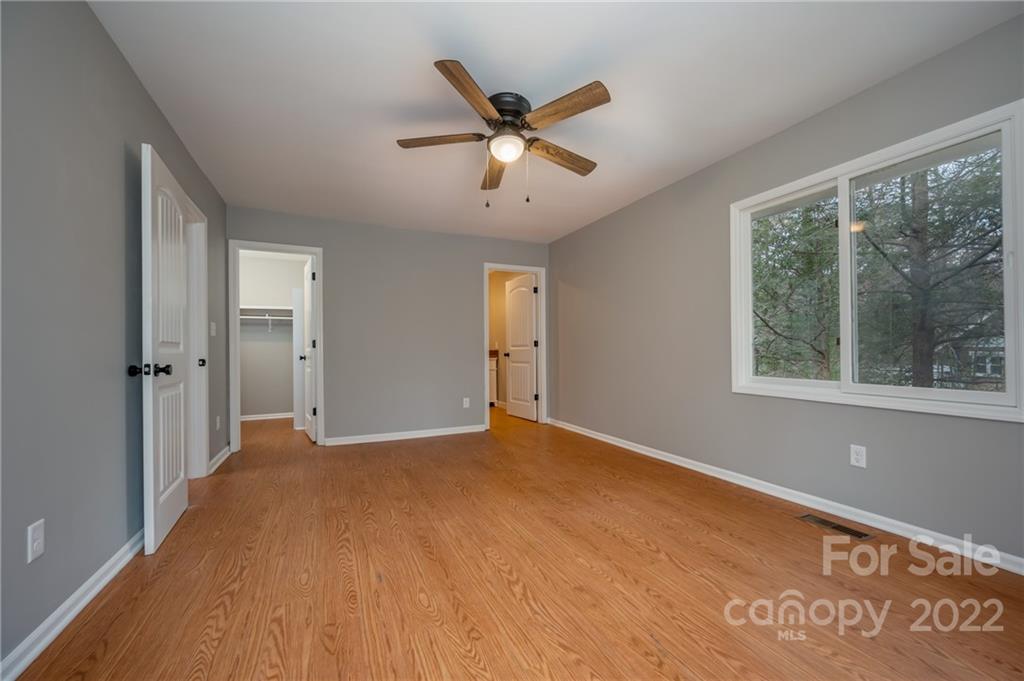 241 Hidden Hill Road Tryon, NC 28782 - Photo 14 of 39 a view of an empty room with a window