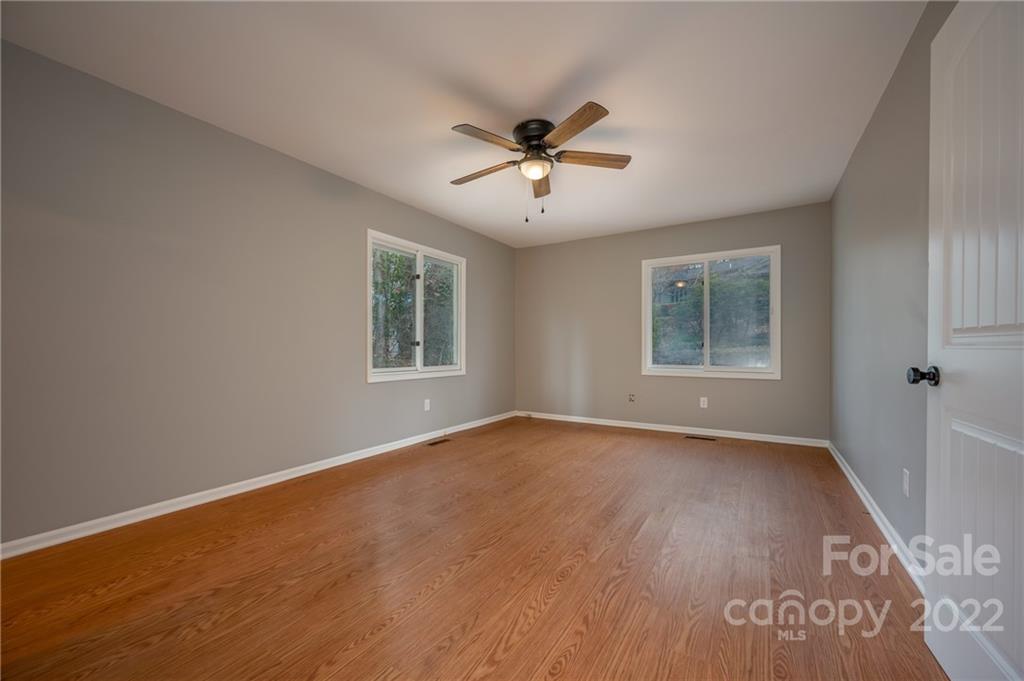 241 Hidden Hill Road Tryon, NC 28782 - Photo 15 of 39 a view of an empty room with a window