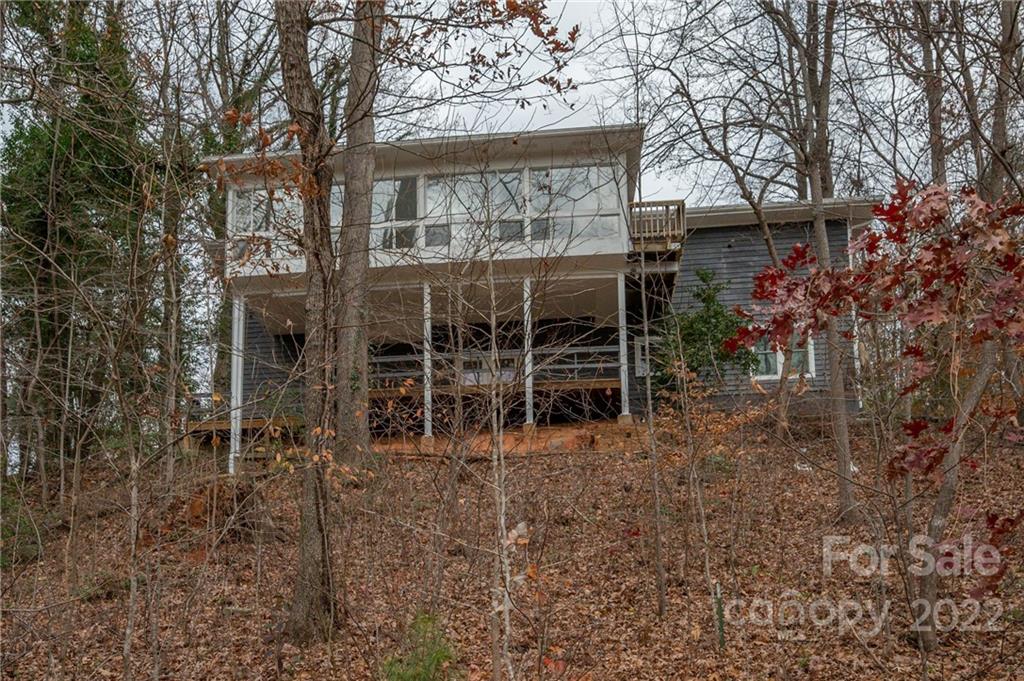 241 Hidden Hill Road Tryon, NC 28782 - Photo 39 of 39 a view of a house with a yard and sitting area