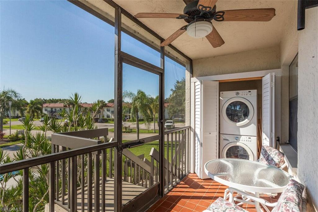 4345 27th Court Southwest, Unit 202 Naples, FL 34116 - Photo 2 of 26 a view of a living room and balcony