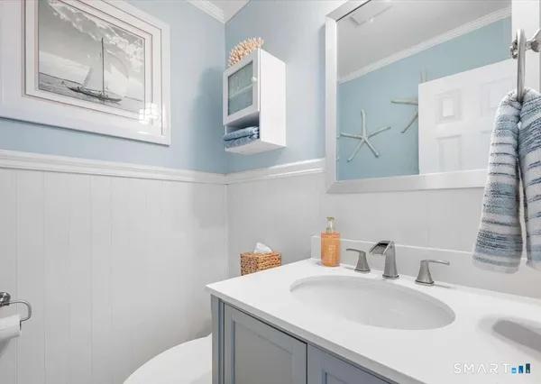 a bathroom with a sink and a toilet