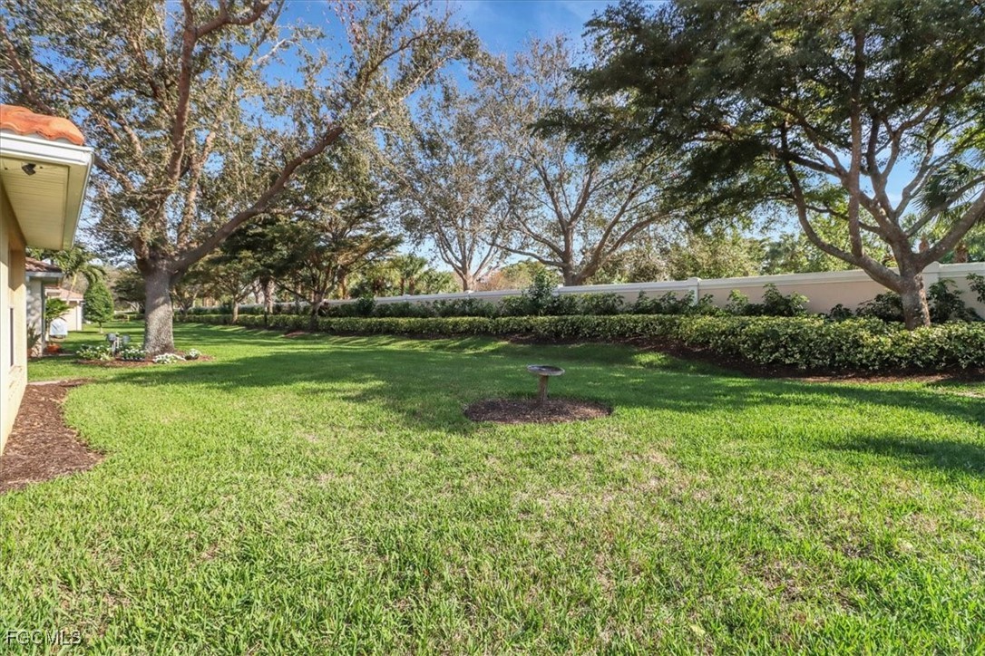 19674 Villa Rosa Loop Estero, FL 33967 - Photo 19 of 33 a view of a park that has large trees
