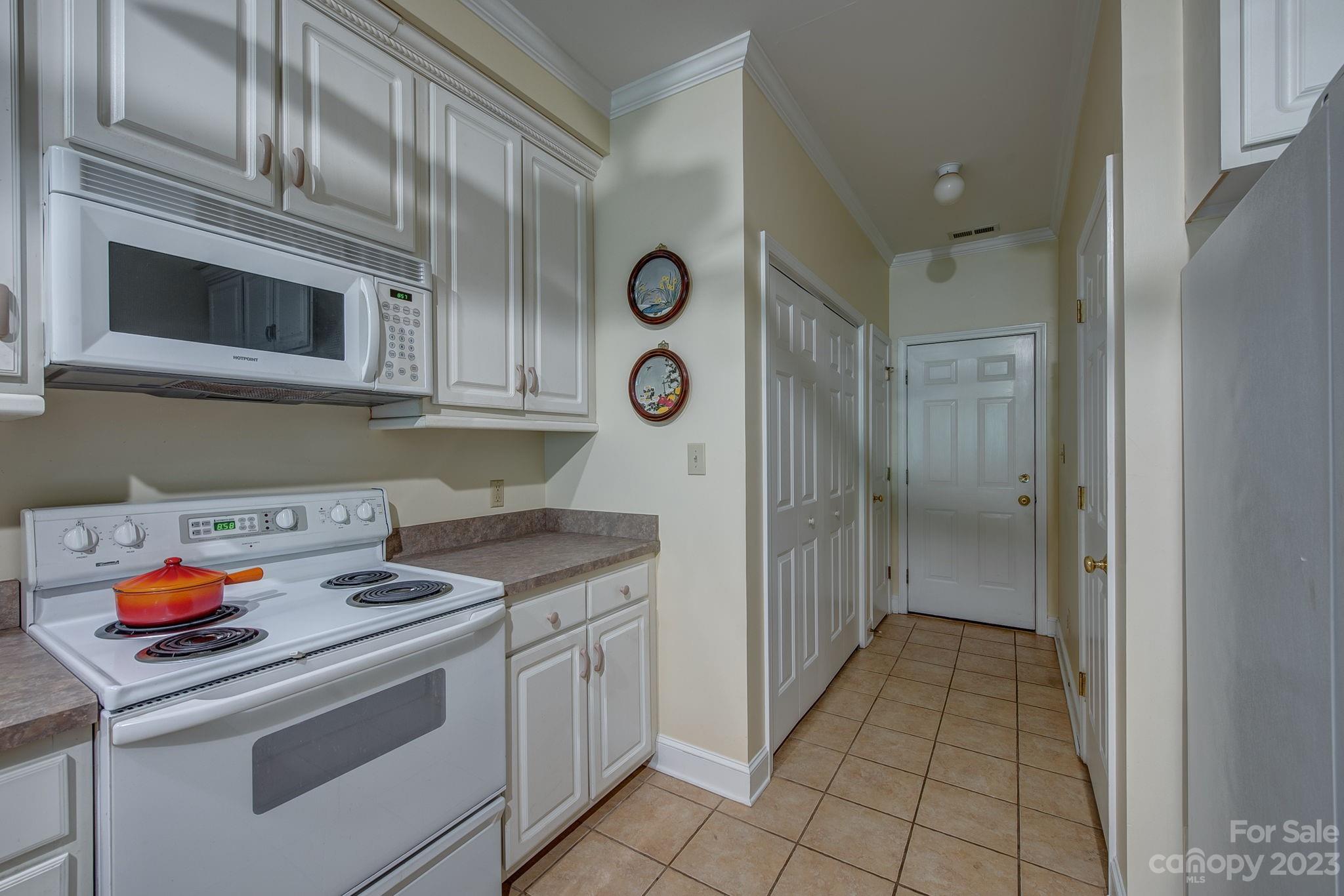 110 Columns Circle Shelby, NC 28150 - Photo 17 of 33 a kitchen with granite countertop a sink stove and cabinets