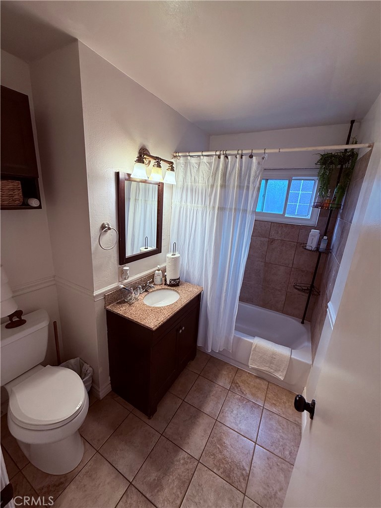 19303 Kemp Avenue Carson, CA 90746 - Photo 11 of 13 a bathroom with a sink toilet and tub