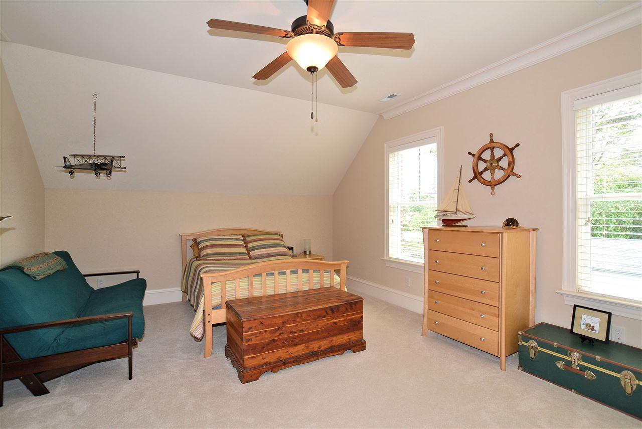 1322 Dogwood Lane Raleigh, NC 27607 - Photo 17 of 30 BR 4 features a Walk-in Closet with Custom Built-ins. All the Bedrooms have Ceiling Fans with Lights & all Closets have Custom Built-ins. 2nd Floor Bedroom 4