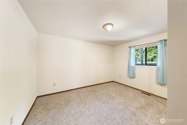 a bathroom with a tub and a sink