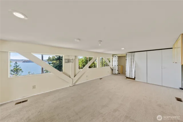 a bathroom with a toilet sink and shower