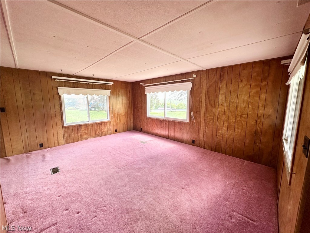 28 Richter Road Colliers, WV 26035 - Photo 2 of 38 Living room featuring carpet flooring