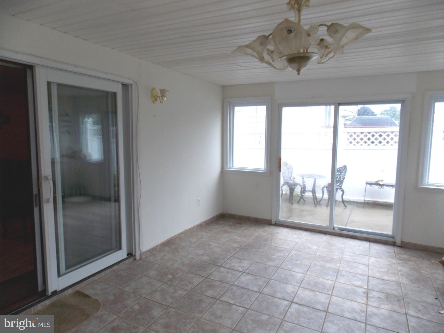 9739 Chapel Road Philadelphia, PA 19115 - Photo 11 of 15 Sun Room