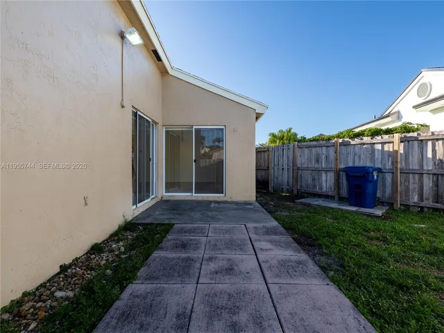 a view of a balcony with chairs