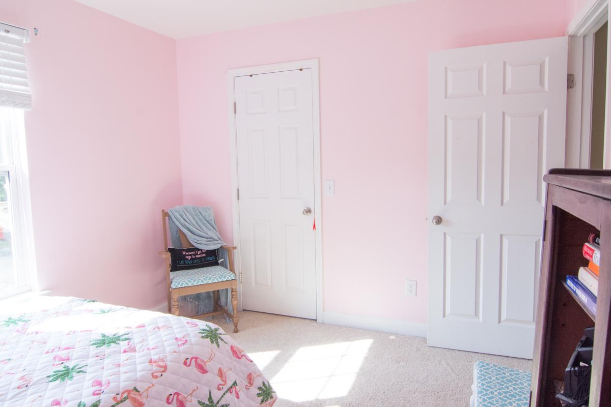 3535 Bell Road, Unit 705 Nashville, TN 37214 - Photo 18 of 20 a bedroom with a bed and a closet