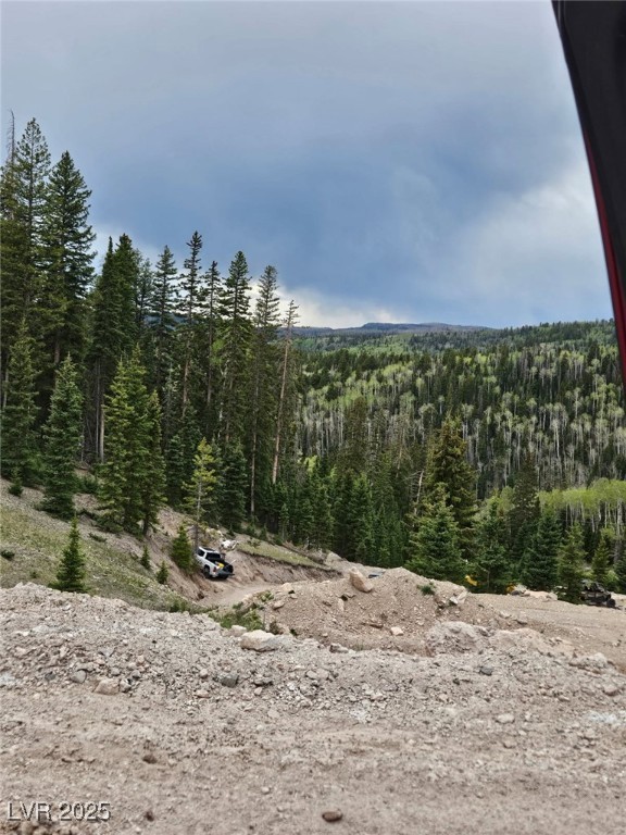 39 West Village Beaver, UT 84713 - Photo 5 of 10 View of mountain background featuring a forest