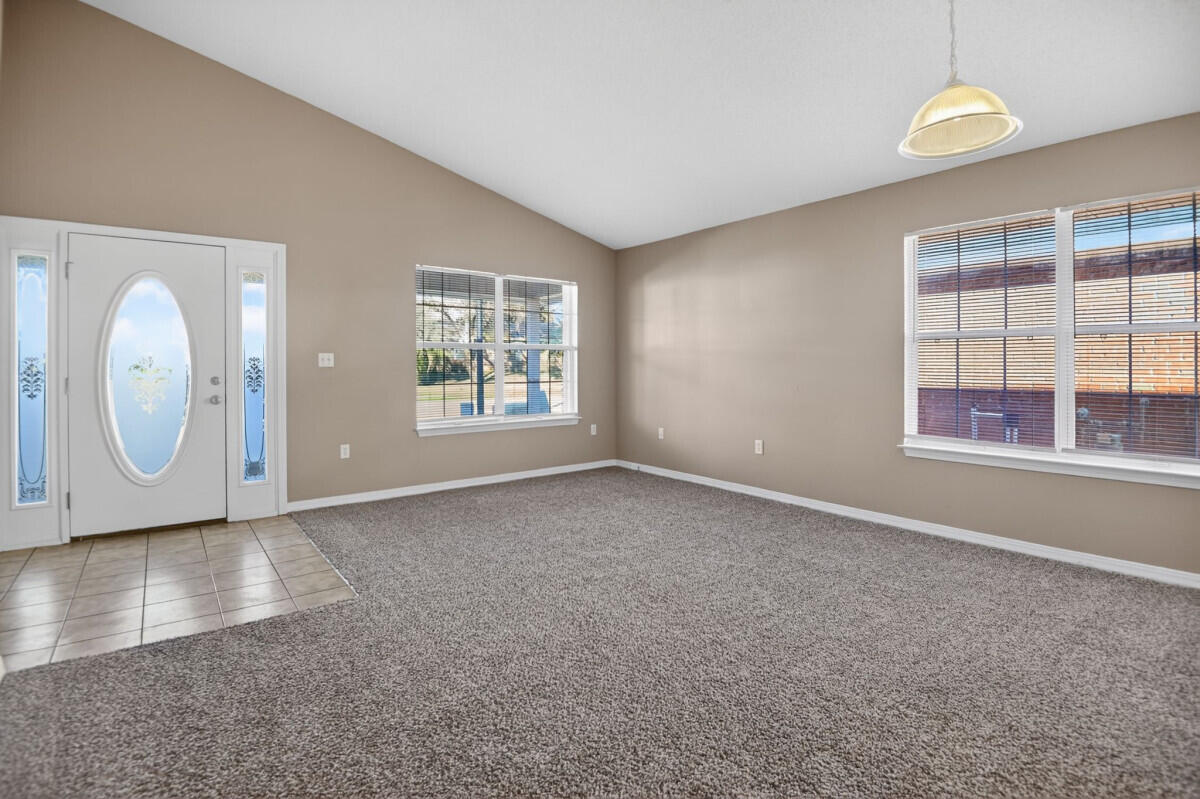 4654 Sunsail Circle Destin, FL 32541 - Photo 3 of 22 an empty room with windows